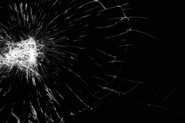 istock Broken glass - white lines on black background, design element. touch screen smartphone with broken screen 1344787961