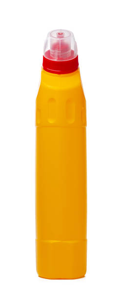 istock Orange plastic bottle of liquid detergent isolated on white 1344795398