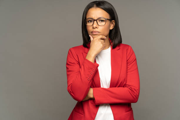 istock Puzzled thoughtful businesswoman doubtful think on business development strategy or partnership 1344796260