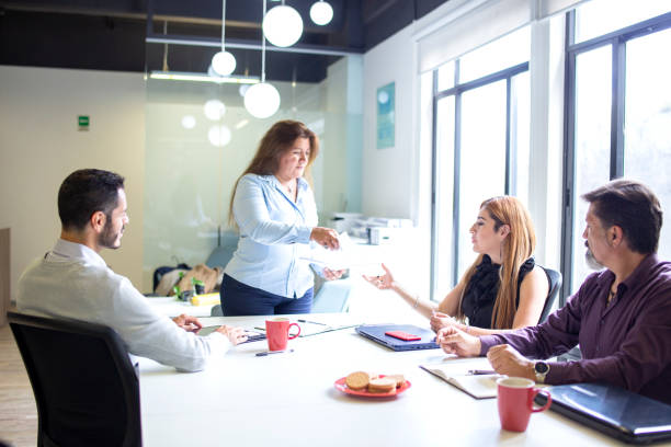 istock Group of people working in the office 1344798108