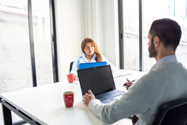 istock Man and woman working in the office 1344799107
