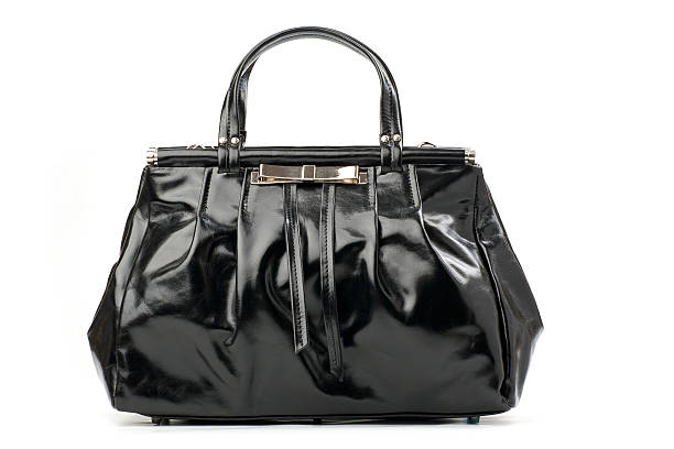 Black female handbag over white stock photo