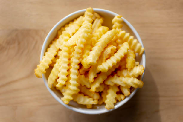 istock Bowl with french fried potatos 1344807383