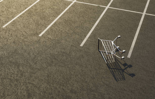 shopping cart overturned on a parking lot shopping cart overturned on a parking lot. 3d rendering abandoned shopping cart stock pictures, royalty-free photos & images