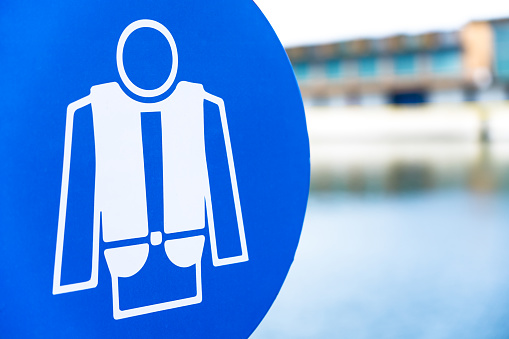 Life jacket required-sign. With copy space. Shot with a 35-mm full-frame 61MP Sony A7R IV.