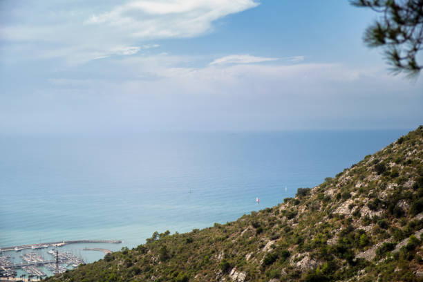 istock Mountains and beach in the morning. 1344808795