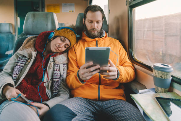 istock Couple traveling with train 1344809473
