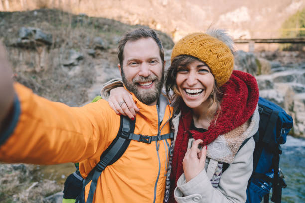 istock Couple on journey taking selfies 1344809578