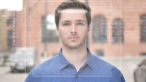 istock Identification of Young Man by Biometric Facial Recognition Scanning System 1344810262