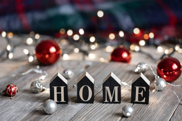istock Christmas background with decorative word home and decor details. 1344811199