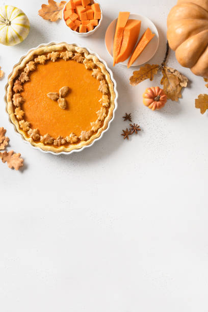 istock Homemade Traditional American Pumpkin Pie on white. 1344811364