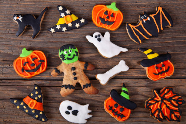 istock Halloween homemade gingerbread cookies on rustic wooden table 1344812114