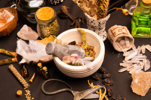 istock Mortar and pestle witchcraft alchemy still life selective focus, witch craft pharmacy and medicine. Spiritual occultism chemistry, magic alchemy and ritual arrangement. 1344818161