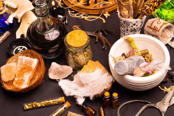 istock Mortar and pestle witchcraft alchemy still life selective focus, witch craft pharmacy and medicine. Spiritual occultism chemistry, magic alchemy and ritual arrangement. 1344818186