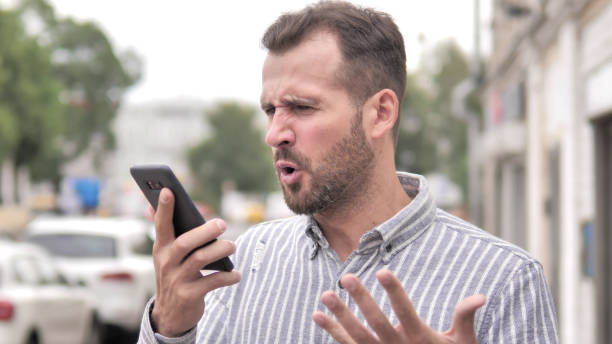 istock Phone Talk by Angry Beard Casual Man 1344818279