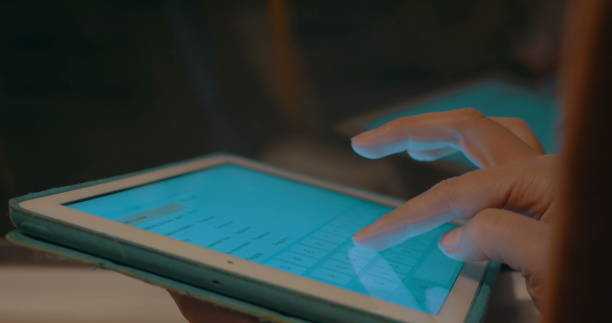 istock Girl communicating on pad in metro train 1344819395