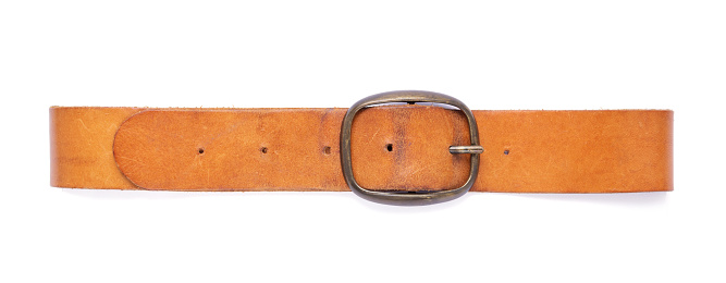 Old leather belt isolated on white background. Old shabby belt with buckle
