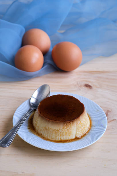 istock Homemade egg custard on wooden table 1344820021