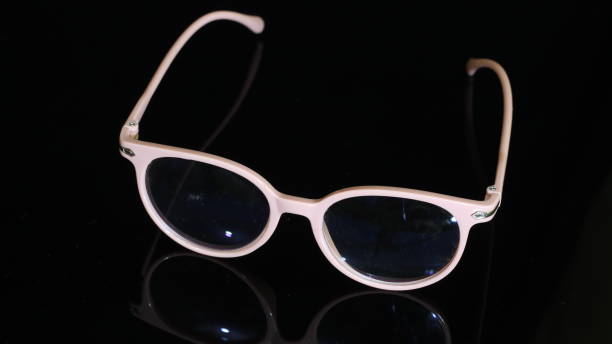 istock Plastic eyeglass frames, contemporary style, on a black background. 1344822274