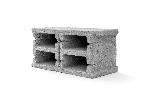 Gray cement cinder block on white background