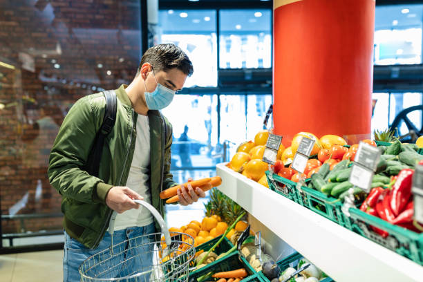 istock Male Buyer Customer Choosing Products. Copy Space 1344825624