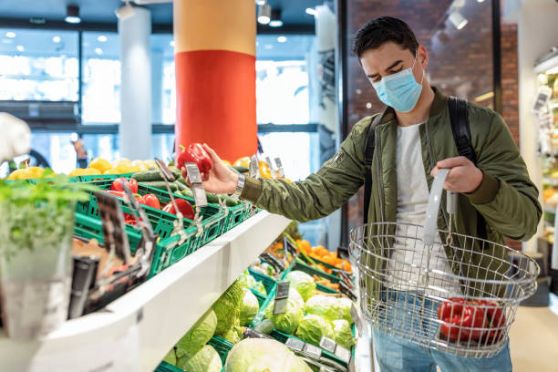 istock Male Buyer Customer Choosing Products. Copy Space 1344825643