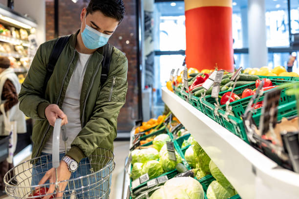 istock Male Buyer Customer Choosing Products. Copy Space 1344825646