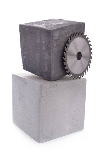 istock Circular blade at concrete cube or cement block isolated on white background 1344825815
