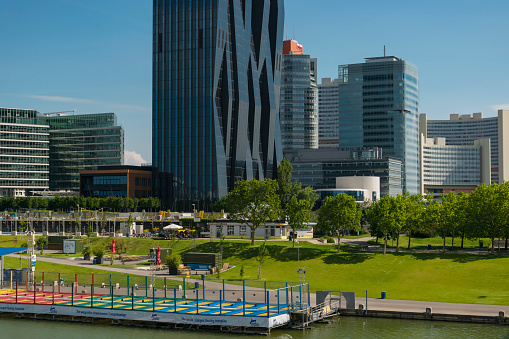 1 June 2019 Vienna, Austria - Donaucity (DC) Tower,  Regus -Vienna. The Vienna International Center is a Complex with skyscrapers, large business hub next to the Danube River. Sunny summer day