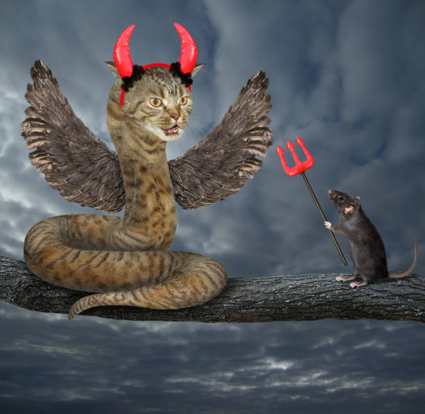 istock Cat snake with wings on branch 1344828876
