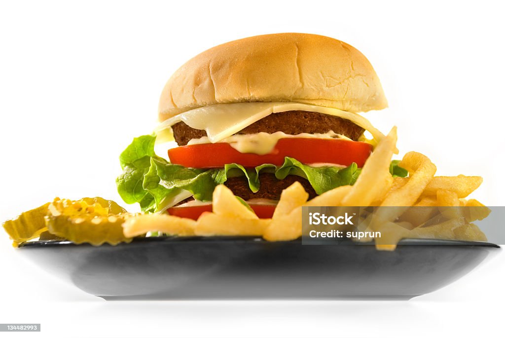 Burger with Fries Isolated on White Burger with Fries and Pickles Isolated on White Burger Stock Photo