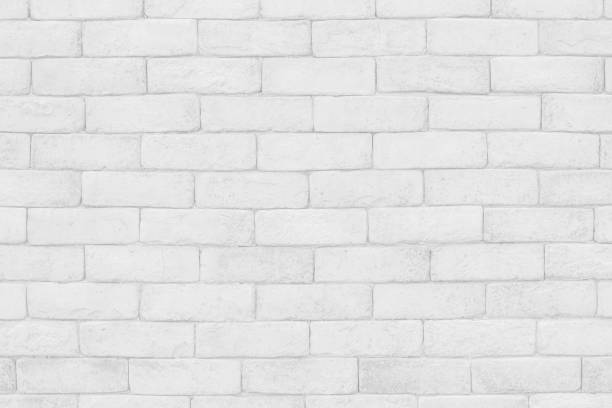 istock White grunge brick wall texture background for stone tile block painted in grey light color wallpaper modern interior and exterior and room backdrop design 1344833396