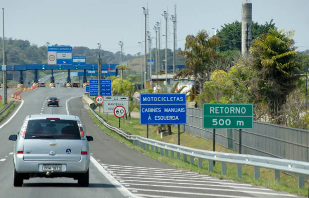 Toll signs on the highway, written in Portuguese, Brazil. stock photo