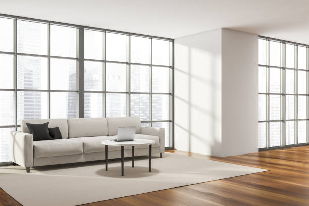 istock Corner view on living room interior with panoramic window 1344835891