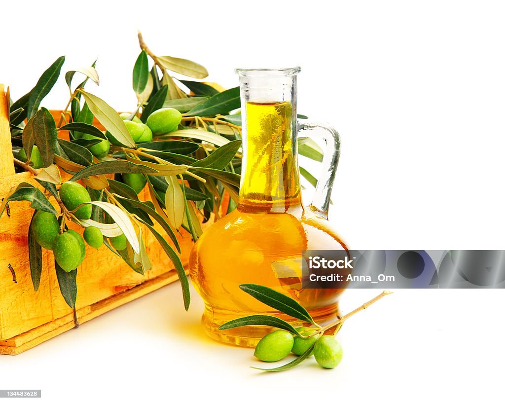 Olive Oil Fresh green olives & oil isolated on white background Antioxidant Stock Photo