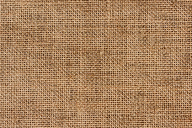 lin naturel brut non coloré en gros plan. sac tissé, sac en toile de jute texture - burlap sack photos et images de collection