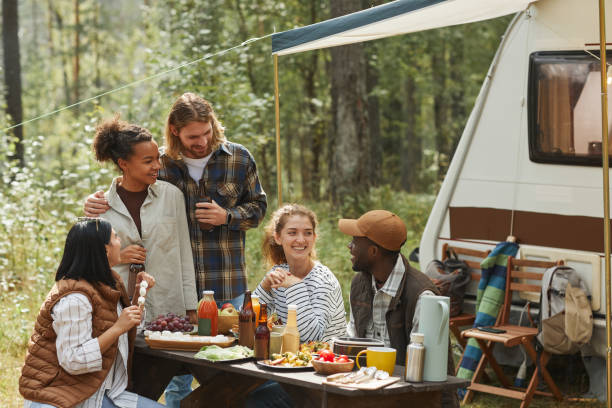 istock Friends Dining Outdoors at Campsite 1344837098