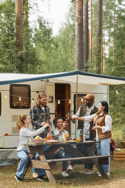 istock Group of Young People Camping in Autumn 1344837110