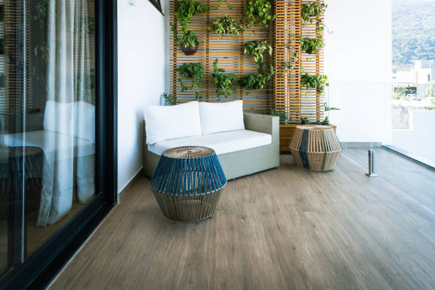 istock Bedroom bag with sofa and wall of plants 1344838370