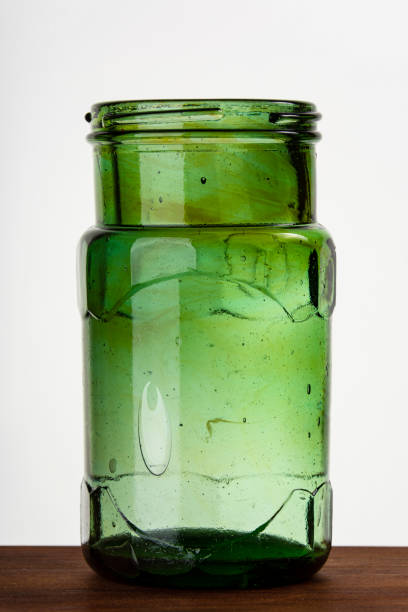Rustic and old, small glass Jar - Green glass