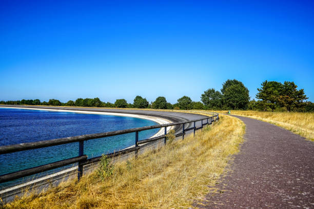 istock A path next to a water reservoir in summer in Germany. 1344845498