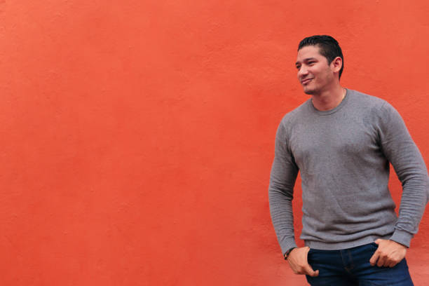 istock Latino hipster walking down the street. 1344846547