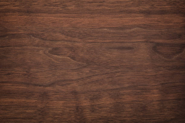 istock brown wood texture, dark wood background. rustic table boards as wallpaper 1344847299