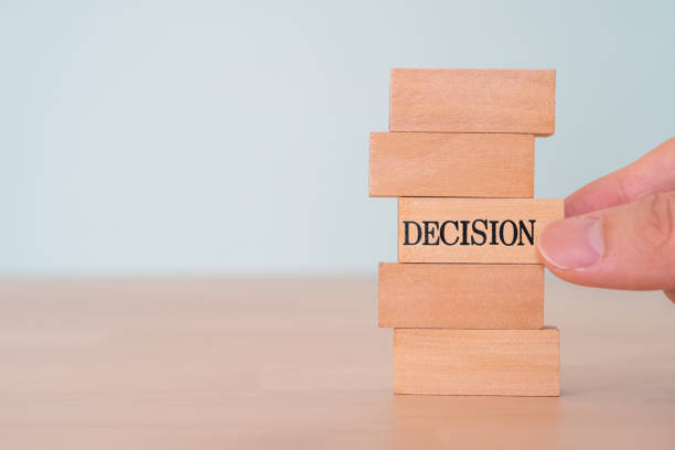 istock DECISION; Wooden blocks with 