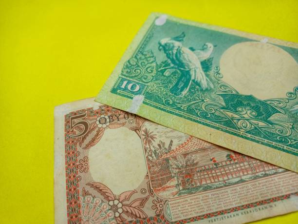 istock Indonesian currency five rupiahs and ten rupiahs valid in 1958 1344848595
