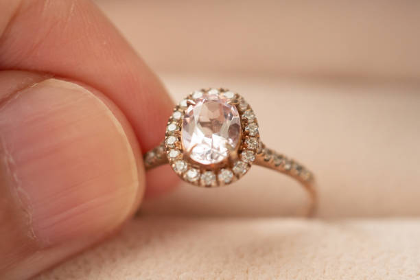 istock hand hold beautiful jewelry diamond ring 1344850284