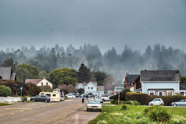 town mendocino and fog rolling in Mendocino, United States - February 16 2020: the small famous historic coastal town and the fog rolling in mendocino county photos stock pictures, royalty-free photos & images