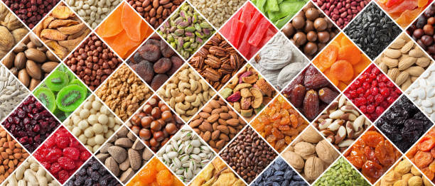 istock assorted nuts and dried fruit, large mix organic food background. 1344852058