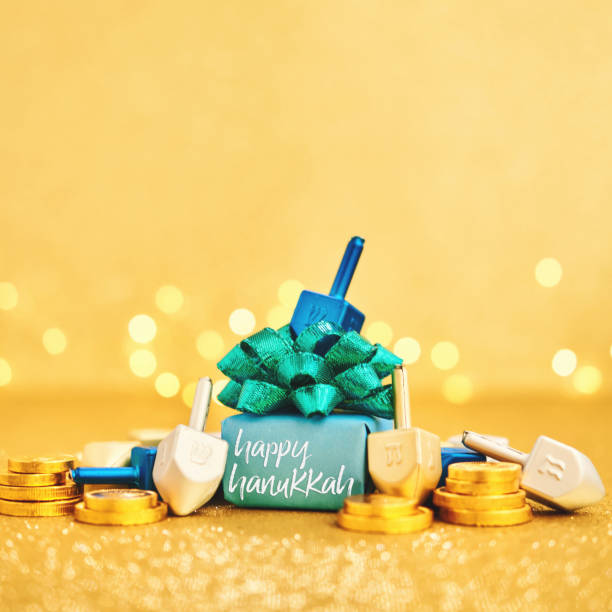 hanukkah holiday background with gift and gelt and dreidel - gelt imagens e fotografias de stock