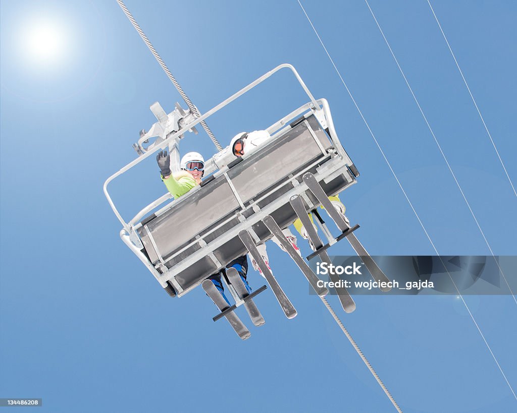 Skiers on ski ascensor - Foto de stock de Accesorio de cabeza libre de derechos